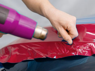 Car featuring a sleek and eye-catching custom wrap for an enhanced, personalized look